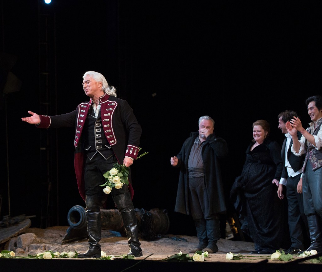 Dmitri Hvorostovsky is applauded by his costars at the curtain call of the Metropolitan Opera's "Il Trovatore" Friday night. Photo: Marty Sohl