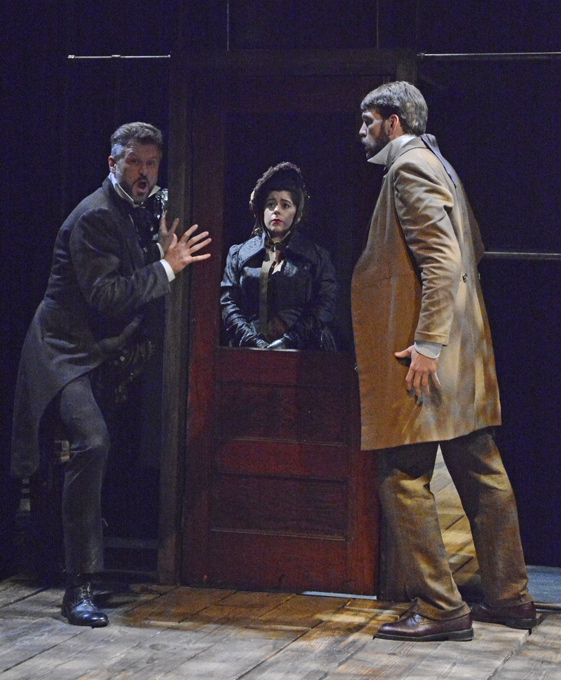 Marc Schreiner, Tess Masters and Jeremy Milner in Carlisle Floyd's "Markheim" presented by Little Opera Theater of New York. Photo: Tina Buckman