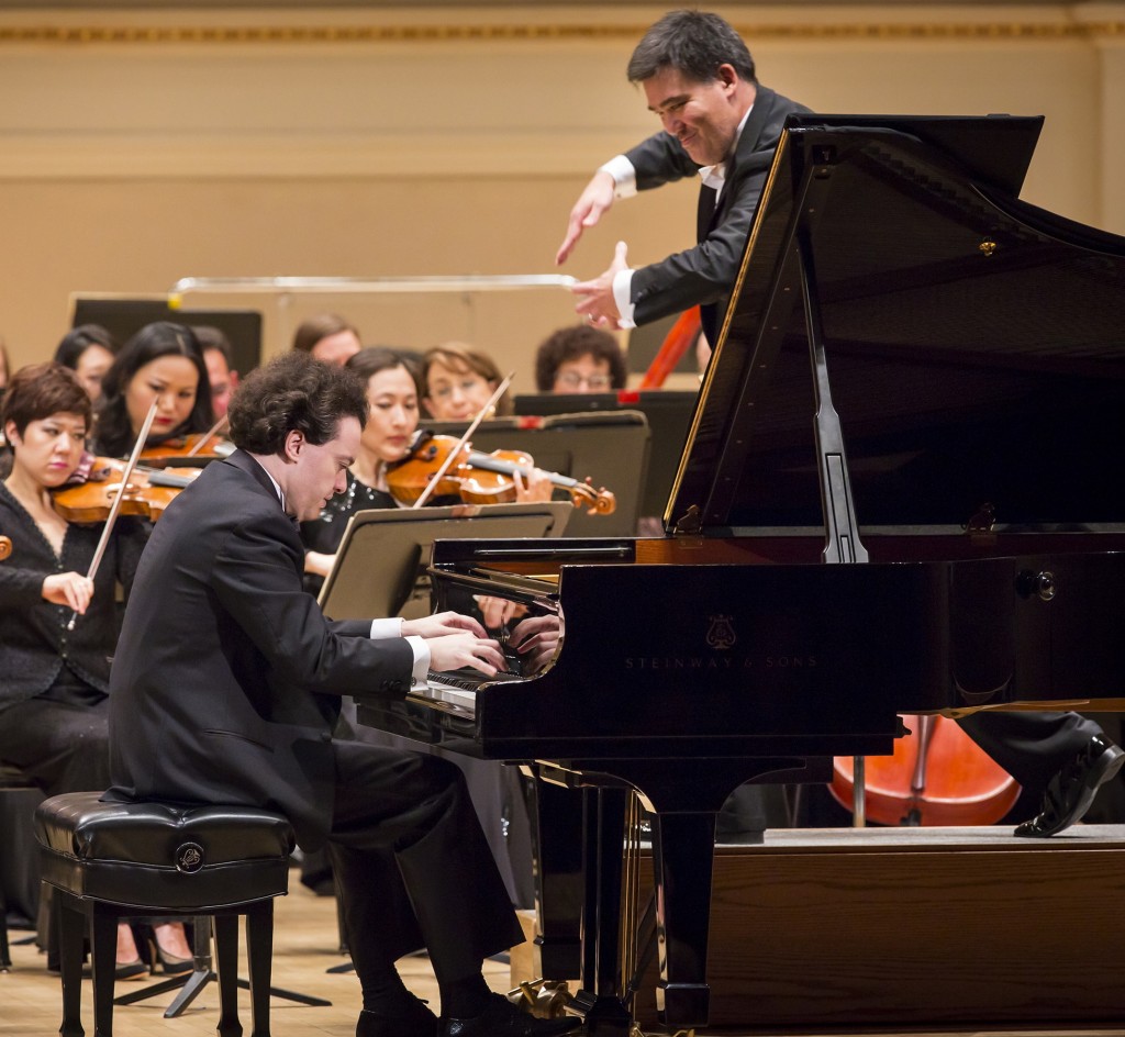 Alan Gilbert conducts the New York Philharmonic at opening night of Carnegie Hall with Evgeny Kissin Wednesday. Photo: Chris Lee
