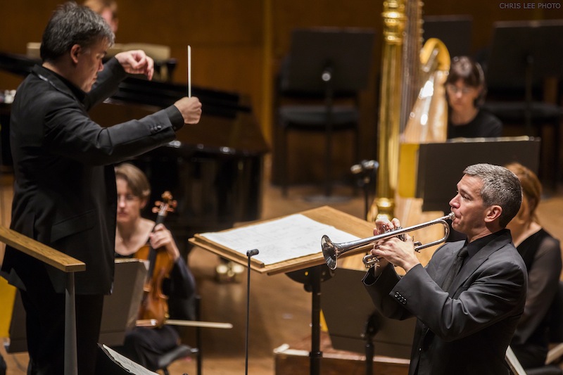 Alan Gilbert conducts the New York Philharmonic in Ligeti's "Mysteries of the Macabre" with principal trumpet Christopher Martin Thursday night at David Geffen Hall. Photo: Chris Lee