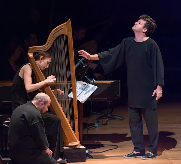 Krystian Adam in the title role of Monterdi's "L'Orfeo" with bass Gianluca Burlatto and harpist Gwyneth Wentink Wednesday night at Lincoln Center. Photo: Kevin Yatarola