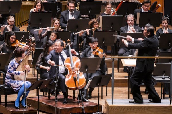 Wu Man and Yo-Yo Ma perform Zhao Lin's "A Happy Excursion" with Long Yu conducting the New York Philharmonic Wednesday night at David Geffen Hall. Photo: Chris Lee