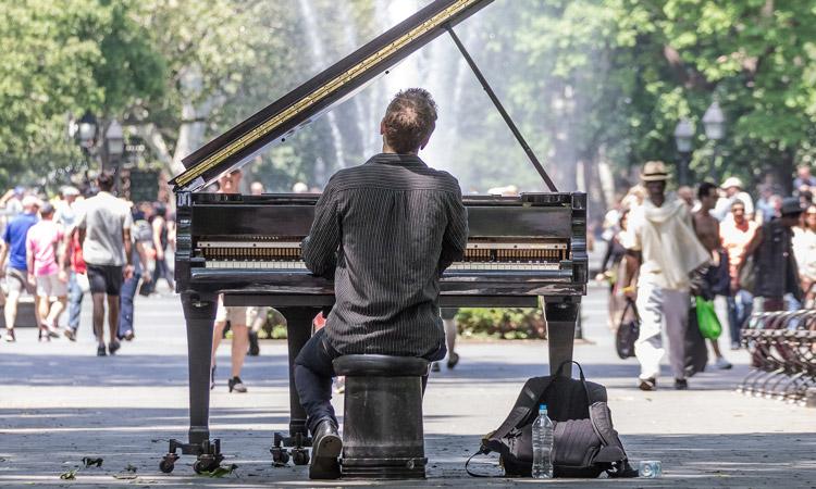 piano-player-in-central-park-new-york-city